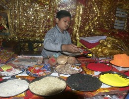 A boy selling offerings at the Bageshowori Devi Temple