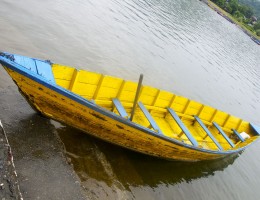 Boat at the bank of Fewa Lake